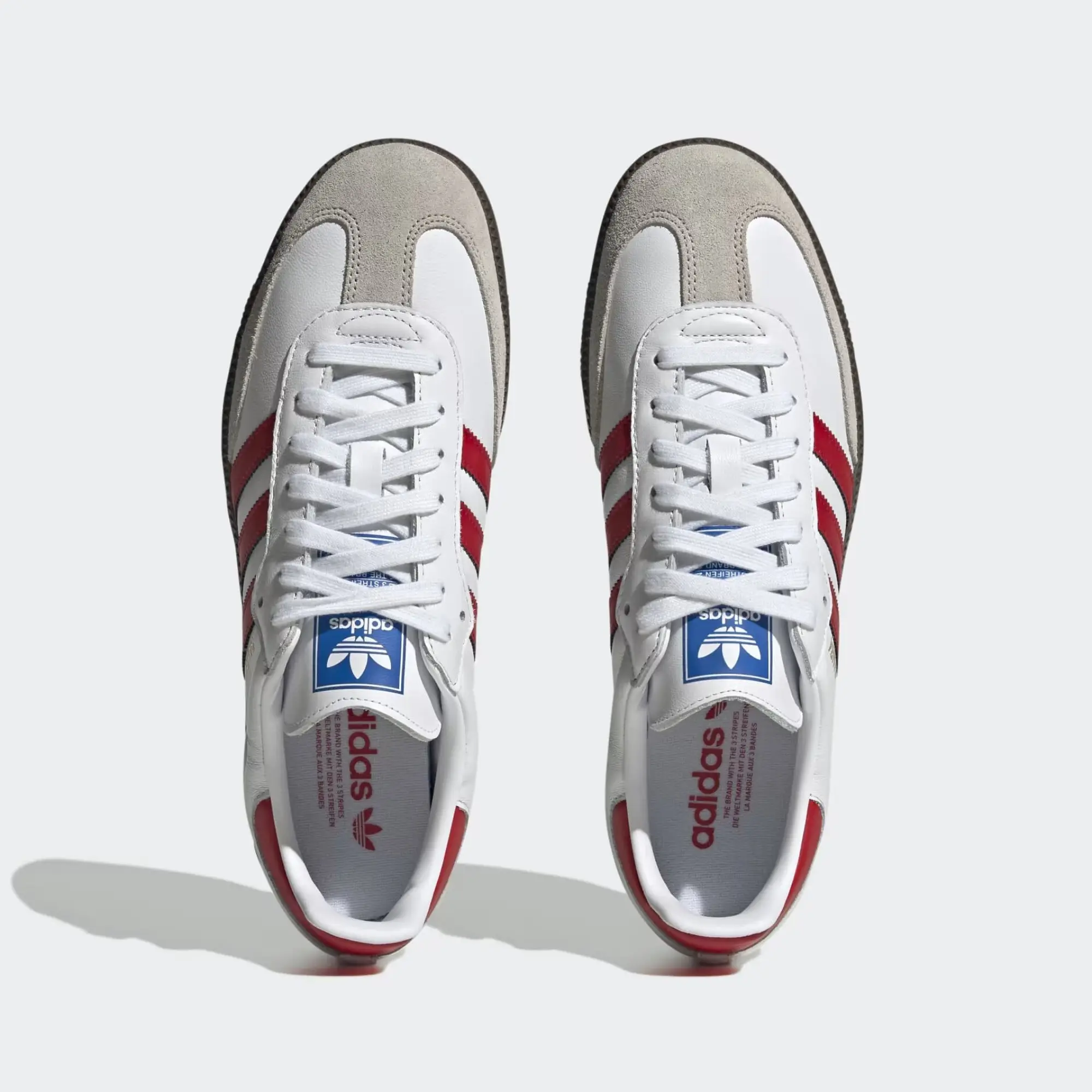 White adidas with red and blue stripes best sale