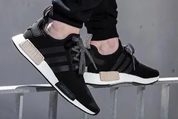 Black nmd outlet